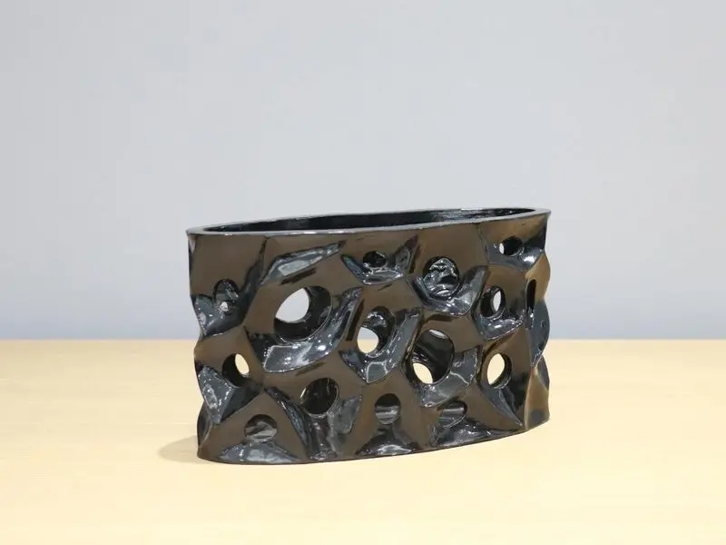 black hollow vase
