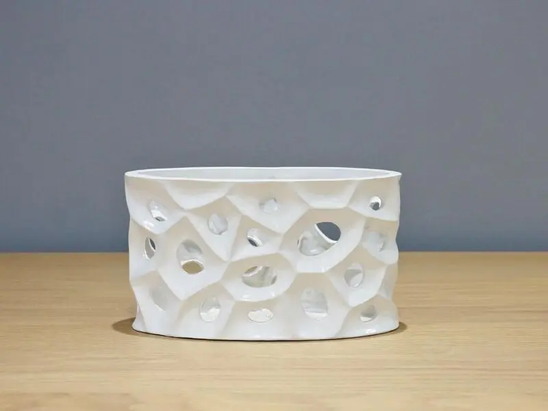 white hollow vase
