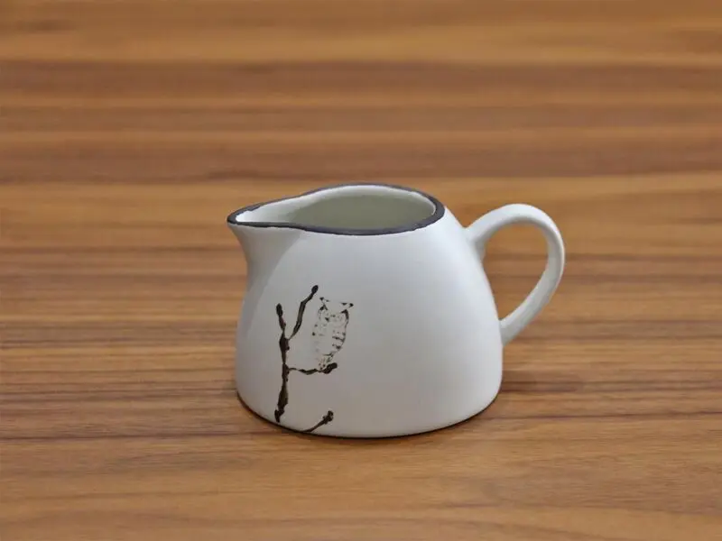 owl design milk pot