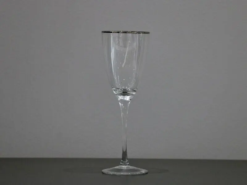 red wine glass with silver rim