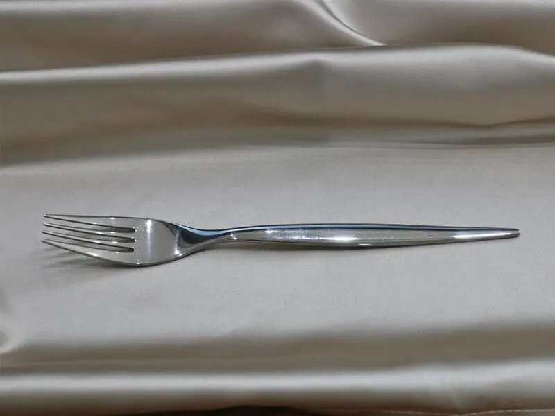shiny silver-colored stainless steel table fork