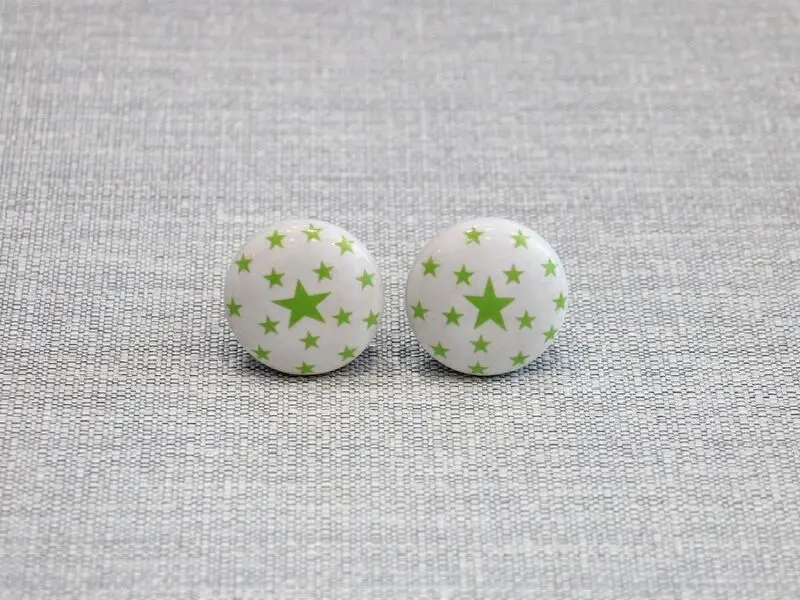 ceramic door knob with green stars