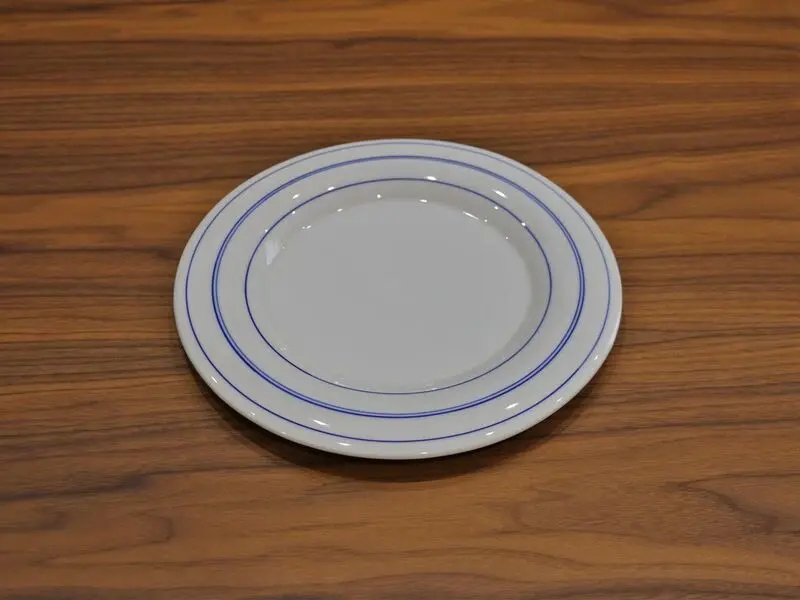 white plate with blue rim 28cm