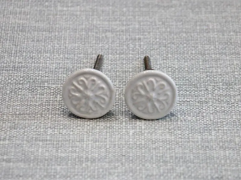 ceramic door knob embossed