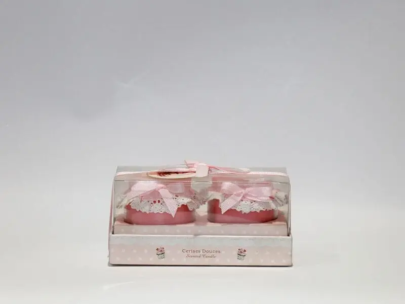 scented pink candles in jars