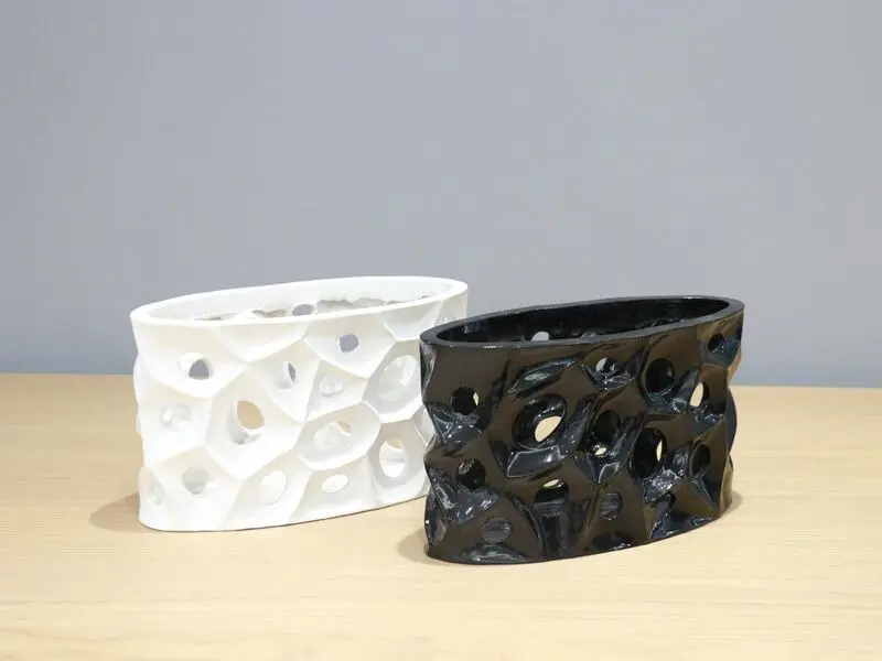 black hollow vase