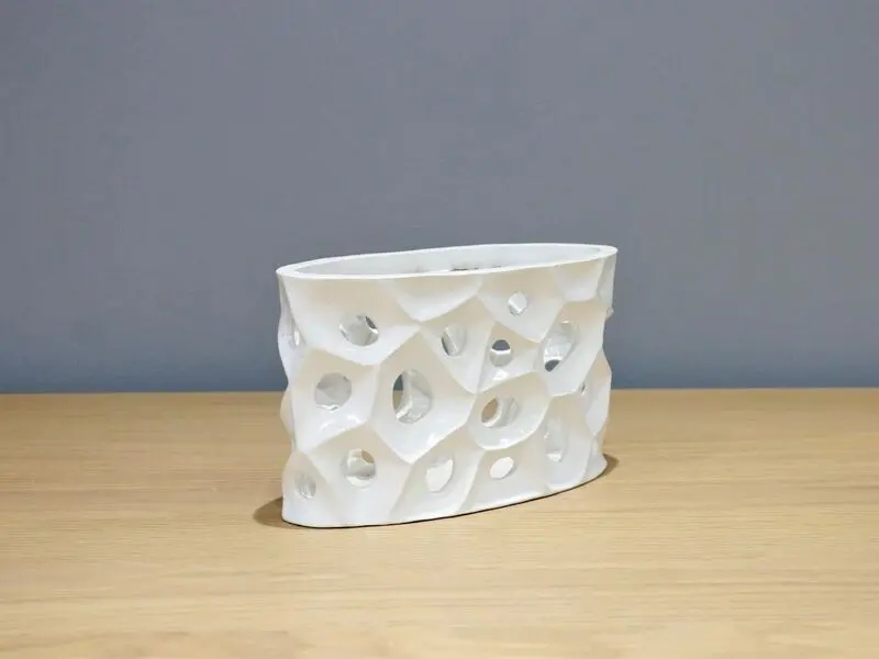 white hollow vase