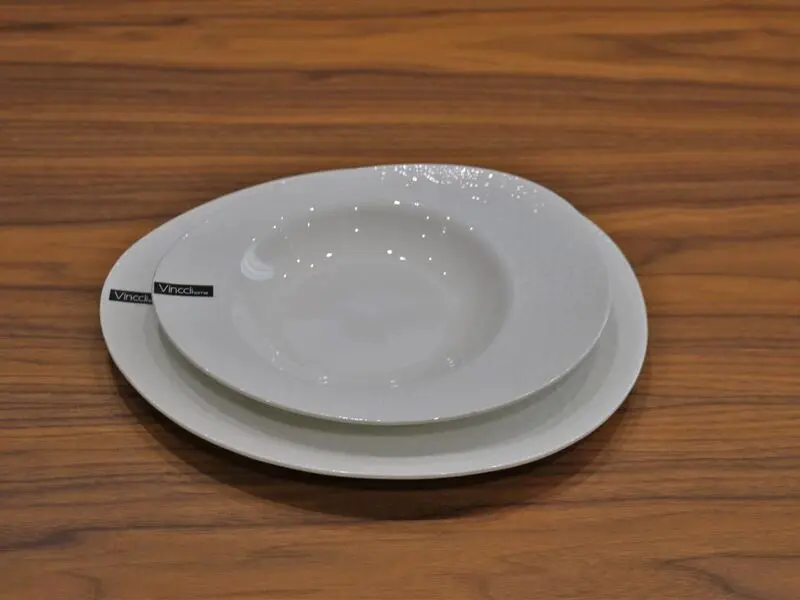 white glossy dinner plate with raised design 27cm