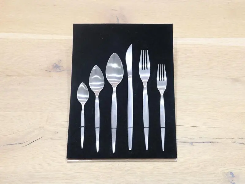 matte silver-colored stainless steel table fork