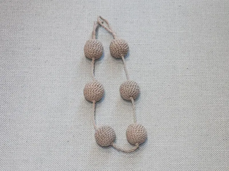 crochet grey balls curtain tie