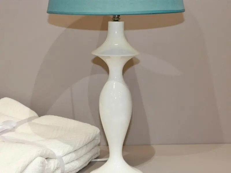 polyresin table lamp with blue shade