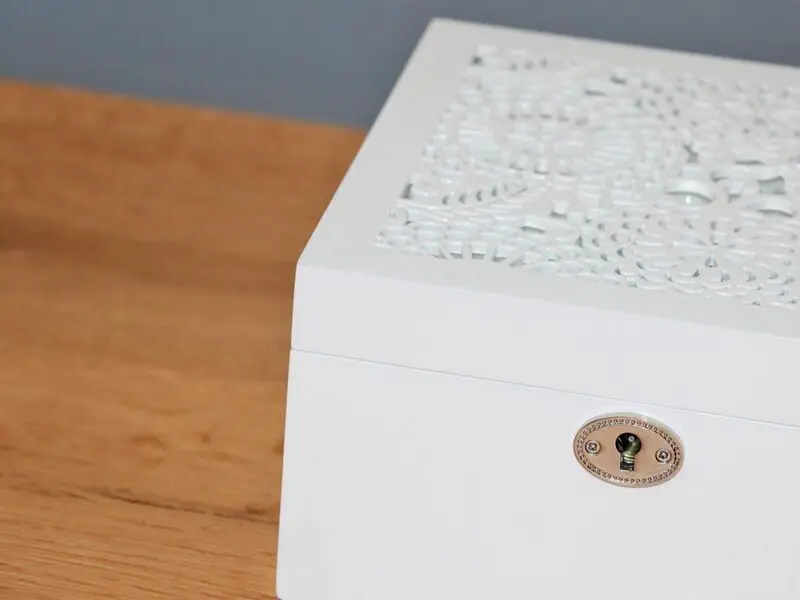 white glossy jewelry box with mirror