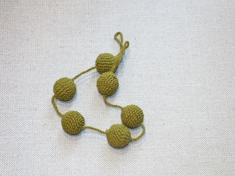 crochet green balls curtain tie