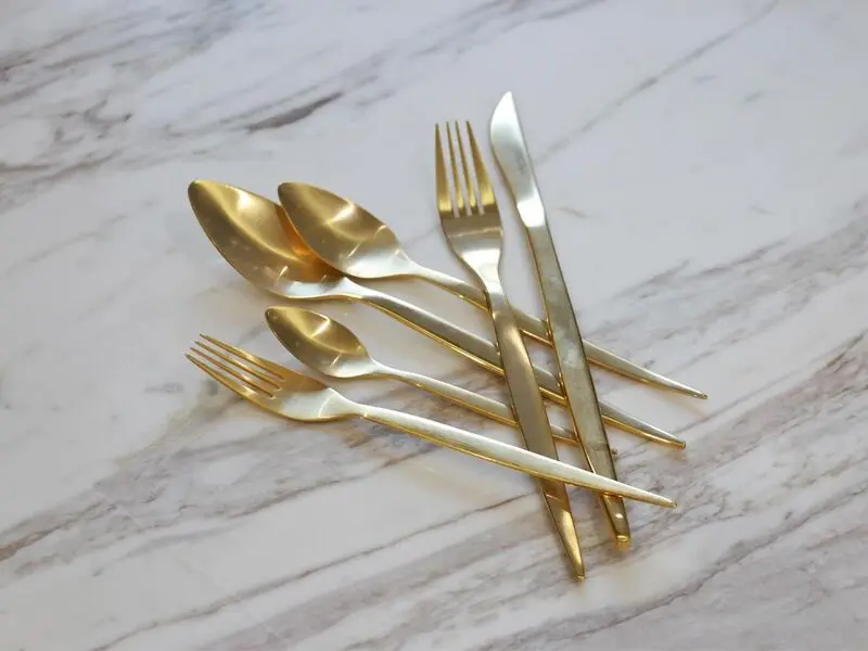 golden stainless steel table knife with matte finish