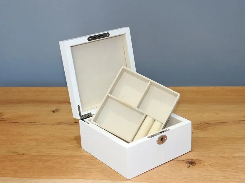 white glossy jewelry box with mirror