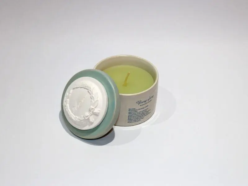 blue scented candle in jar