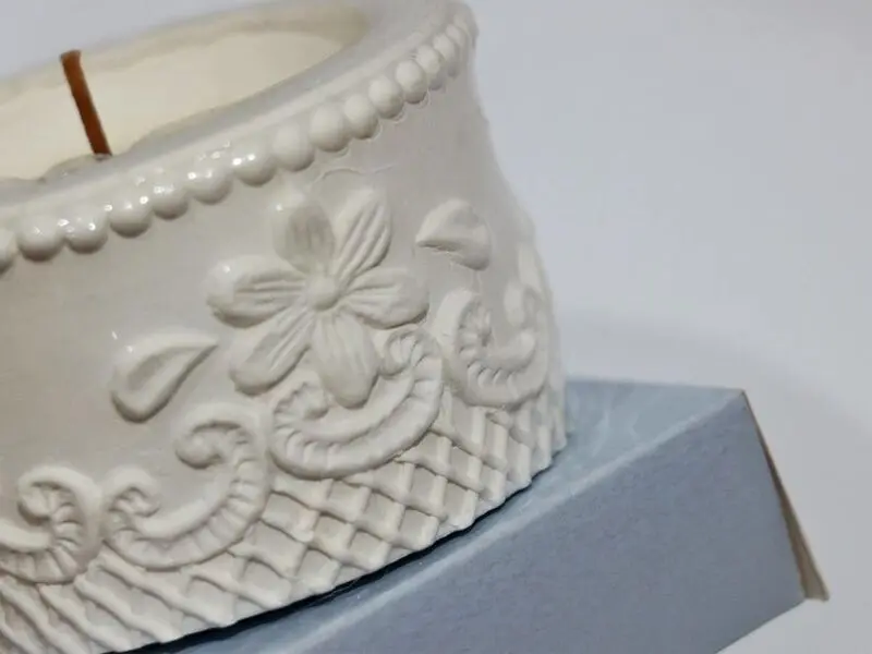 embossed pot design with candle