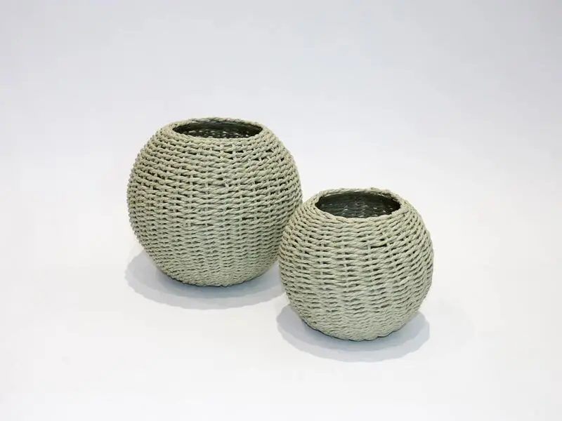 round glass vase covered with green bamboo large