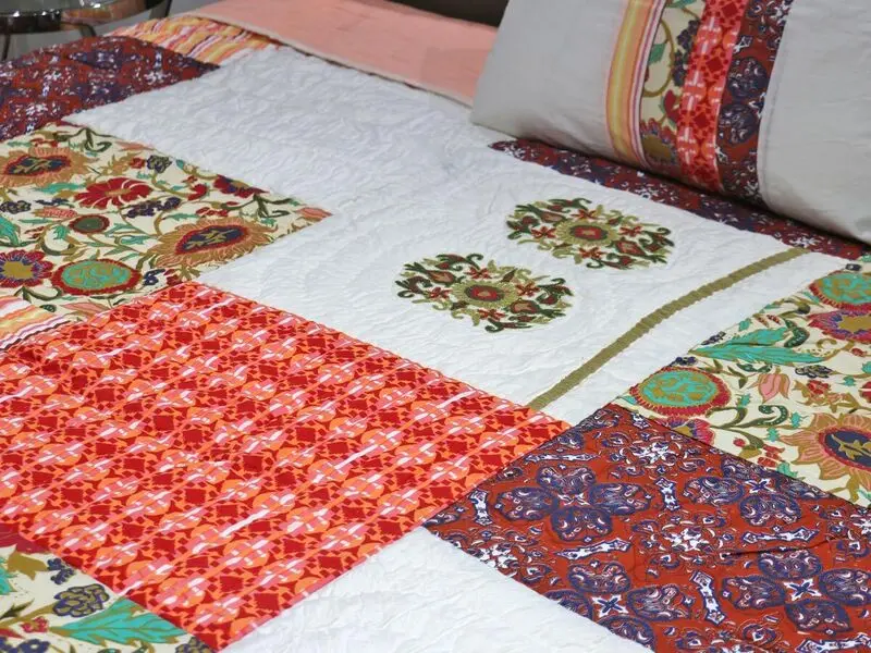 patchwork quilt orange with embroidery details 240x280 cm with two pillow covers