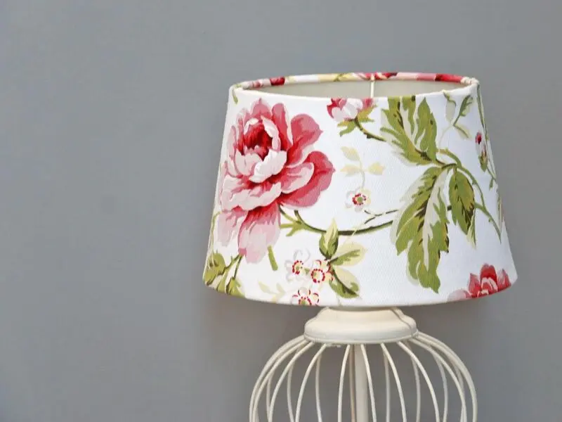 white wired lamp with floral shade