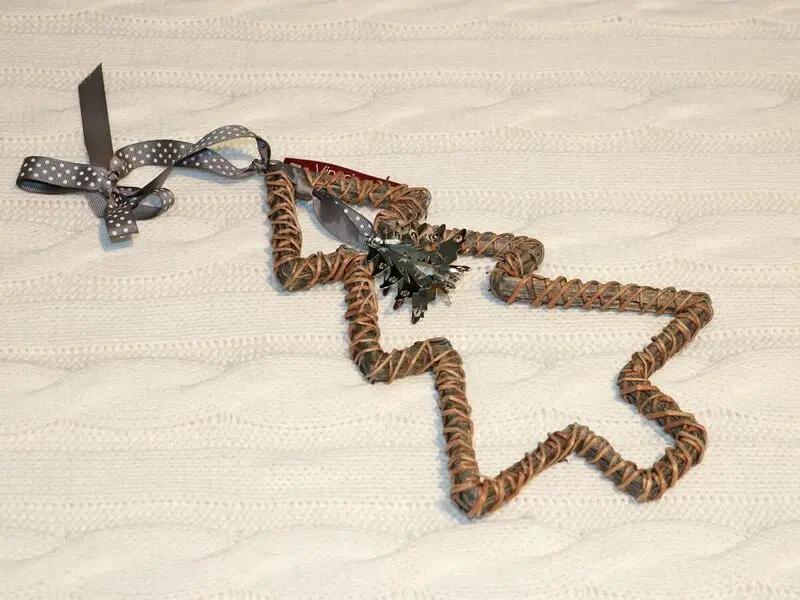 christmas tree with ribbon and iron bell