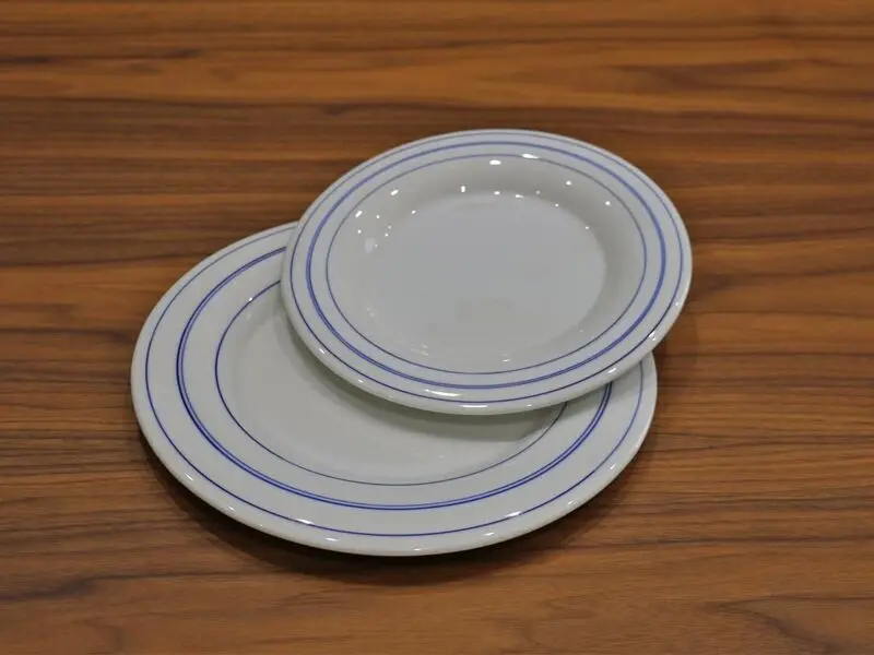 white plate with blue rim 23cm